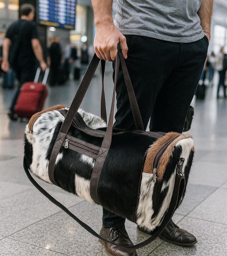set of two cowhide leather duffel set one large duffel bag with a matching small toiletry bag , weekender bag cowhide bag