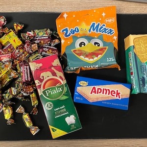 A tea party box, and and a variety of sweets included Great gift idea