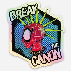 May include: A holographic sticker with a cartoon image of a red and blue Spider-Man with a mohawk. The text "Break the Canon" is written in a colorful, stylized font.