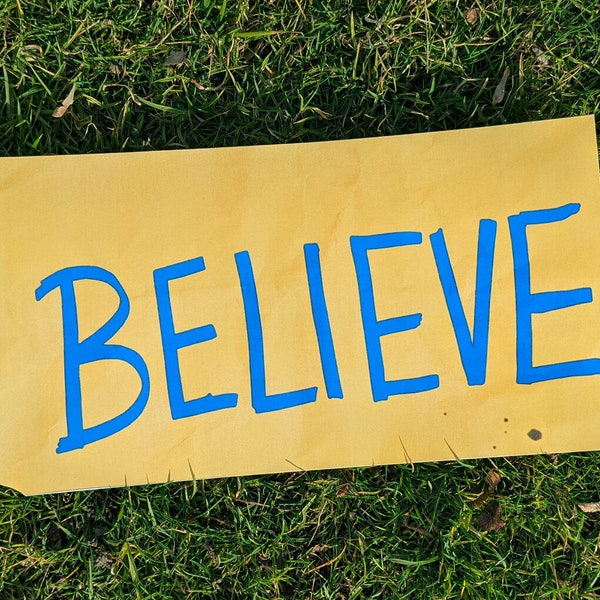 BELIEVE sign or sticker