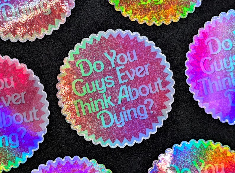 K&ouml;nnte beinhalten: Ein Satz von f&uuml;nf schimmernden Aufklebern mit einem rosa Glitzerhintergrund und wei&szlig;em Text. Der Text auf den Aufklebern lautet "Do You Guys Ever Think About Dying?"