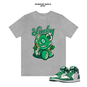 Air Jordan 1 High OG George Green Match Shirts, Lucky Monster Graphic tees, Sneaker tops