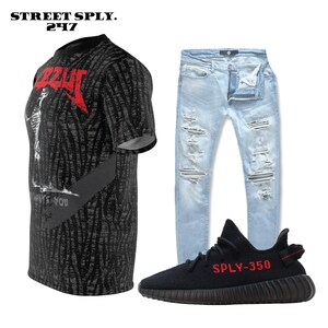 May include: A black t-shirt with a graphic print of a skeleton and the text "What's You". Light blue distressed jeans and black sneakers with the text "SPLY-350" in red.