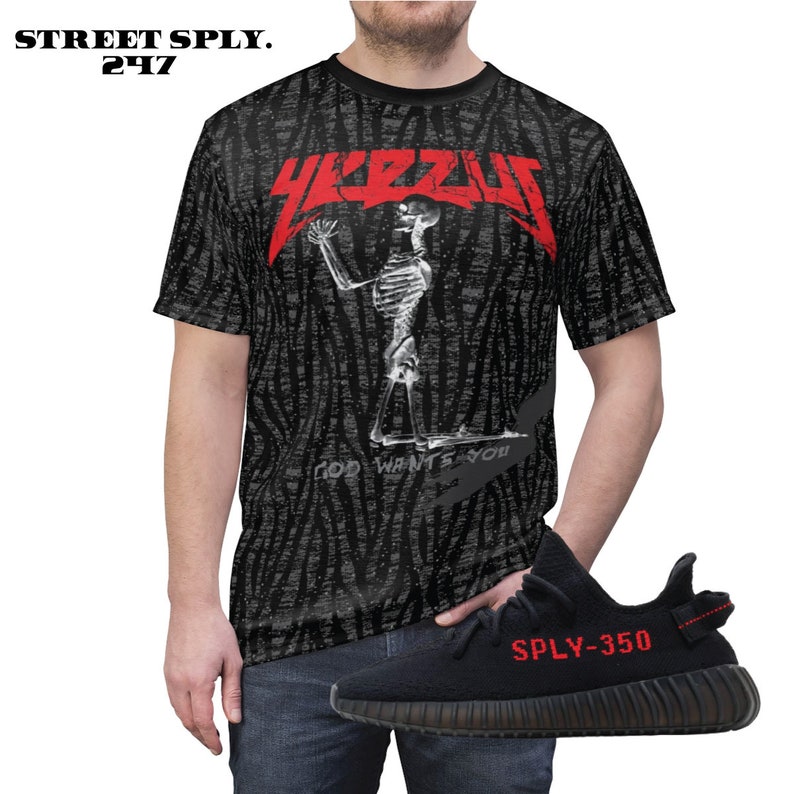 May include: Black and red t-shirt with a skeleton graphic and the text "YEEZUS" and "GOD WANTS YOU". Black and red sneakers with the text "SPLY-350".