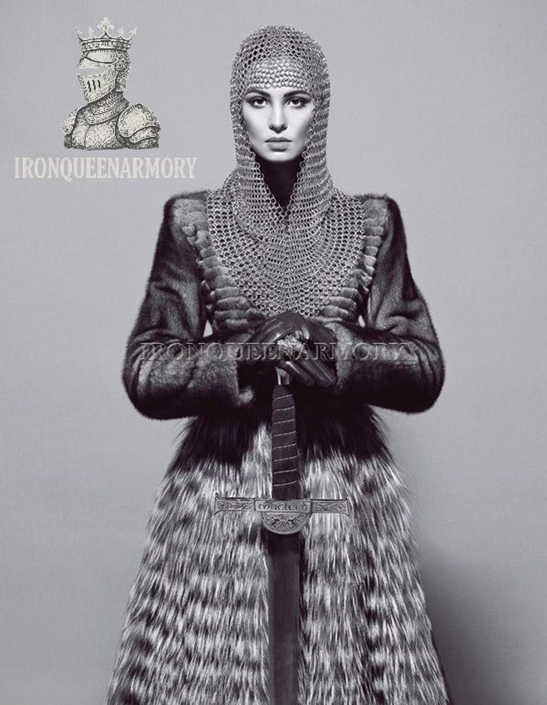 May include: A monochrome image featuring a person in chainmail, a fur coat, and holding a sword. The image includes the text "IRONQUEENARMORY" and a drawing of a knight's helmet.