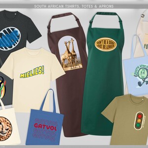 May include: A selection of South African themed t-shirts, tote bags, and aprons. The t-shirts feature various designs and text, including the word "MIELIES!". The aprons are brown, green, and beige. The tote bags are light blue, gray, and beige. The text "DON'T BE A DOOS JUST BE LEKKER" is visible.