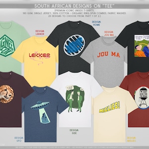 May include: A selection of unisex t-shirts in various colours, including green, yellow, grey, and black. The shirts display different designs, such as text like "AGNEE", "LEKKER", and "JOU MA". Other designs include a cheetah, an alien, and a barbecue.