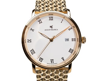 May include: A gold-tone wristwatch with a white face, Roman numeral hour markers, and a date window at the 3 o'clock position. The watch has a gold-tone metal band with a textured pattern.