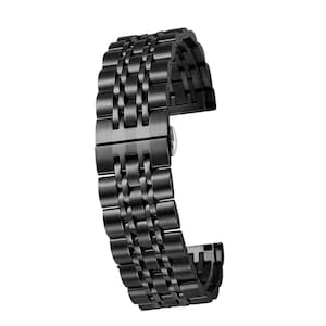 May include: A black metal watch band with a brushed finish. The band has a clasp closure and is designed for a watch with a 20mm lug width.