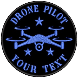 May include: Black and blue embroidered patch with the text "Drone Pilot" and "Your Text" around a blue drone graphic with four propellers and five stars.