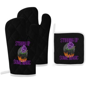 May include: Black quilted oven mitts and a pot holder set with a witchy theme. The design features a cauldron with purple smoke and the text "Stirring Up Some Magic" in purple. The pot holder has a white border.