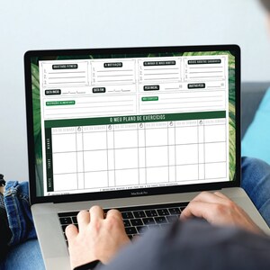May include: A printable fitness planner on a laptop screen. The planner includes sections for fitness goals, motivation, eliminating bad habits, and new healthy habits. It also includes a weekly workout schedule.