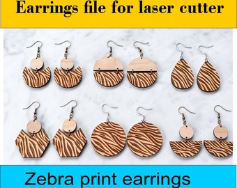 May include: Digital download file for laser cutter earrings featuring a zebra print design. The file includes SVG, JPG, PDF, and PNG formats.