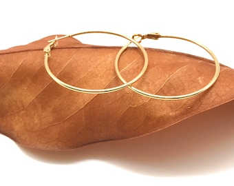 Pendientes de aro de oro amarillo de 14 quilates: diseño italiano hecho a mano.