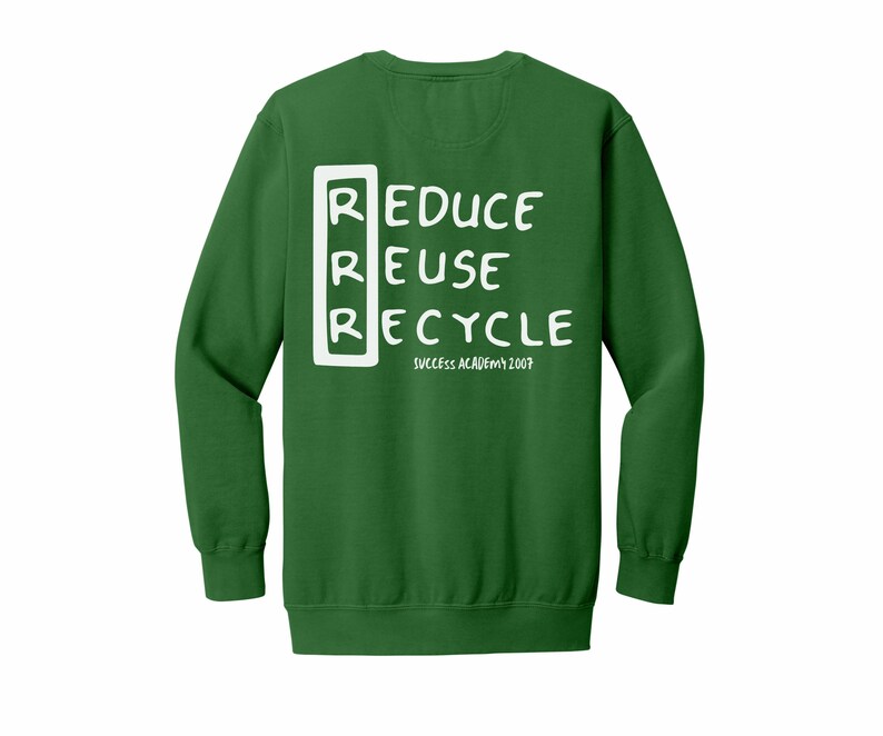 May include: Green long-sleeve sweatshirt with white text that reads "Reduce Reuse Recycle" in a box with the letters "RRR" in the corner. The text "Success Academy 2007" is below the box.