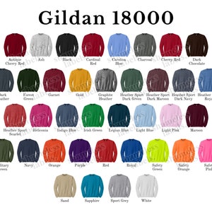 May include: A color chart of Gildan 18000 sweatshirts, showing 36 different colors. The colors are arranged in rows and columns, with each color having a name label below it.
