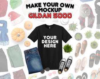 Könnte beinhalten: Ein schwarzes T-Shirt mit dem Text "YOUR DESIGN HERE" darauf. Das T-Shirt ist von verschiedenen Gegenständen umgeben, darunter Jeans, eine Mütze, Sonnenbrillen und Pflanzen. Der Text "MAKE YOUR OWN MOCKUP GILDAN 5000" befindet sich oben im Bild.