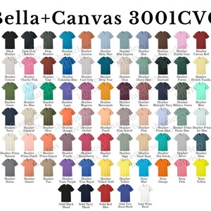 K&ouml;nnte beinhalten: Eine Tabelle mit den Farben der Bella + Canvas 3001CVC T-Shirts. Die Tabelle zeigt 60 verschiedene Farben, darunter Melange-, Uni- und Prismafarben.