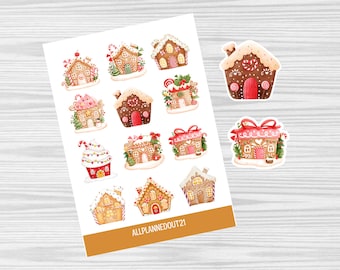 May include: A sheet of 12 gingerbread house stickers with various designs. The stickers are white with a red, brown, and white gingerbread house design. The stickers are perfect for adding a festive touch to your planner, journal, or gifts.