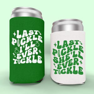 May include: Two can coolers, one green and one white, with the text "LAST PICKLE I'LL EVER TICKLE" and "LAST PICKLE SHE'LL EVER TICKLE" in white and green, respectively. The design includes pickle and ring graphics.