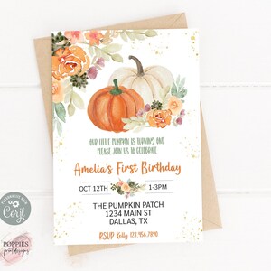 May include: An invitation card with a watercolor design featuring pumpkins and floral accents. The text reads "Amelia's First Birthday" with event details. The card is on a kraft paper envelope.