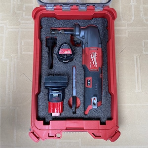May include: Red Milwaukee FUEL right-angle drill in a red carrying case with a battery and a black Sharpie marker.