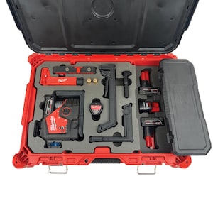May include: An open red Milwaukee tool case with a laser level, two batteries, a tripod, and other accessories. The case has a black foam interior with cutouts for each item.