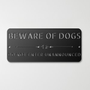 May include: Black metal sign with the text "BEWARE OF DOGS DO NOT ENTER UNANNOUNCED" in white lettering. The sign has a decorative design with a star and dots.