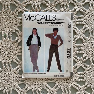 May include: Vintage McCall's sewing pattern for a women's pants pattern. The pattern is for size 12, waist 26 1/2 inches. The pattern is titled "Make It Tonight" and has a photo of a woman wearing the pants.