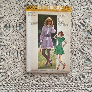May include: Vintage Simplicity sewing pattern number 9803 for a dress. The pattern is for sizes 11/12, young junior/teens and misses. The pattern includes a tissue lesson chart on how to join a skirt to a bodice. The pattern cover features two models wearing the dress in different colours and styles. The text on the cover reads 'How to Sew' Pattern.
