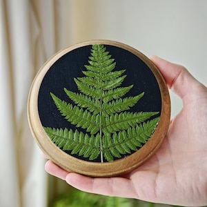 Cottagecore pressed flower artwork, wooden frame with dried fern