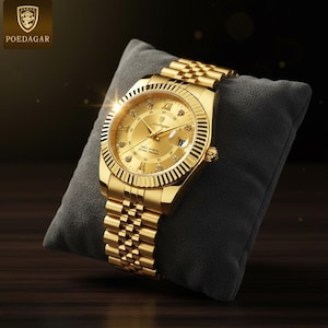 May include: A gold-toned wristwatch with a textured bezel and a matching link band. The watch face features diamond-like markers and Roman numerals. The watch is displayed on a gray pillow.