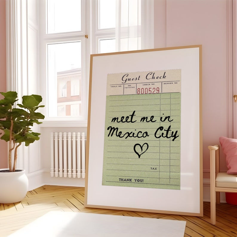 May include: A vintage-style guest check with the text "meet me in Mexico City" written in black cursive with a heart drawn below. The check number is 800529.