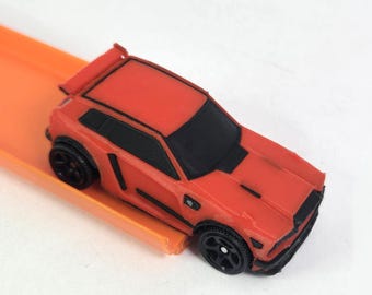 Red 1/64 Scale Model Car - Black Trim - Video Game Rocket Car