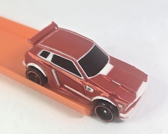 Shiny Red 1/64 Scale Model Car - White Trim - Video Game Rocket Car