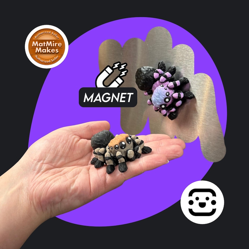 May include: A handmade spider magnet with a black body, tan abdomen, and black and tan legs. The magnet is attached to a silver metal shape. The word "MAGNET" is displayed on a black rectangle.