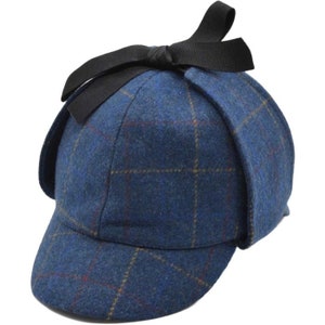 Icône intrigante : le motif à carreaux classique du chapeau de traqueur de Sherlock Holmes Bleu