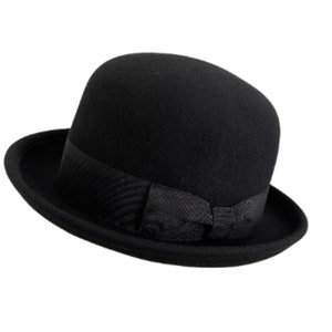 Chapeau melon doux en feutre de laine : design élégant et intemporel Rehaussez votre style avec notre melon doux chic sans effort Acheter maintenant Noir