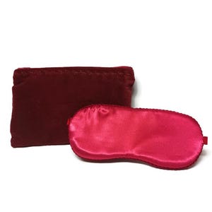 Sleep Eye Mask with its storage bag.