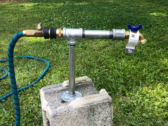 Outdoor Faucet Attaches to a Garden Hose Galvanized Iron Pipe