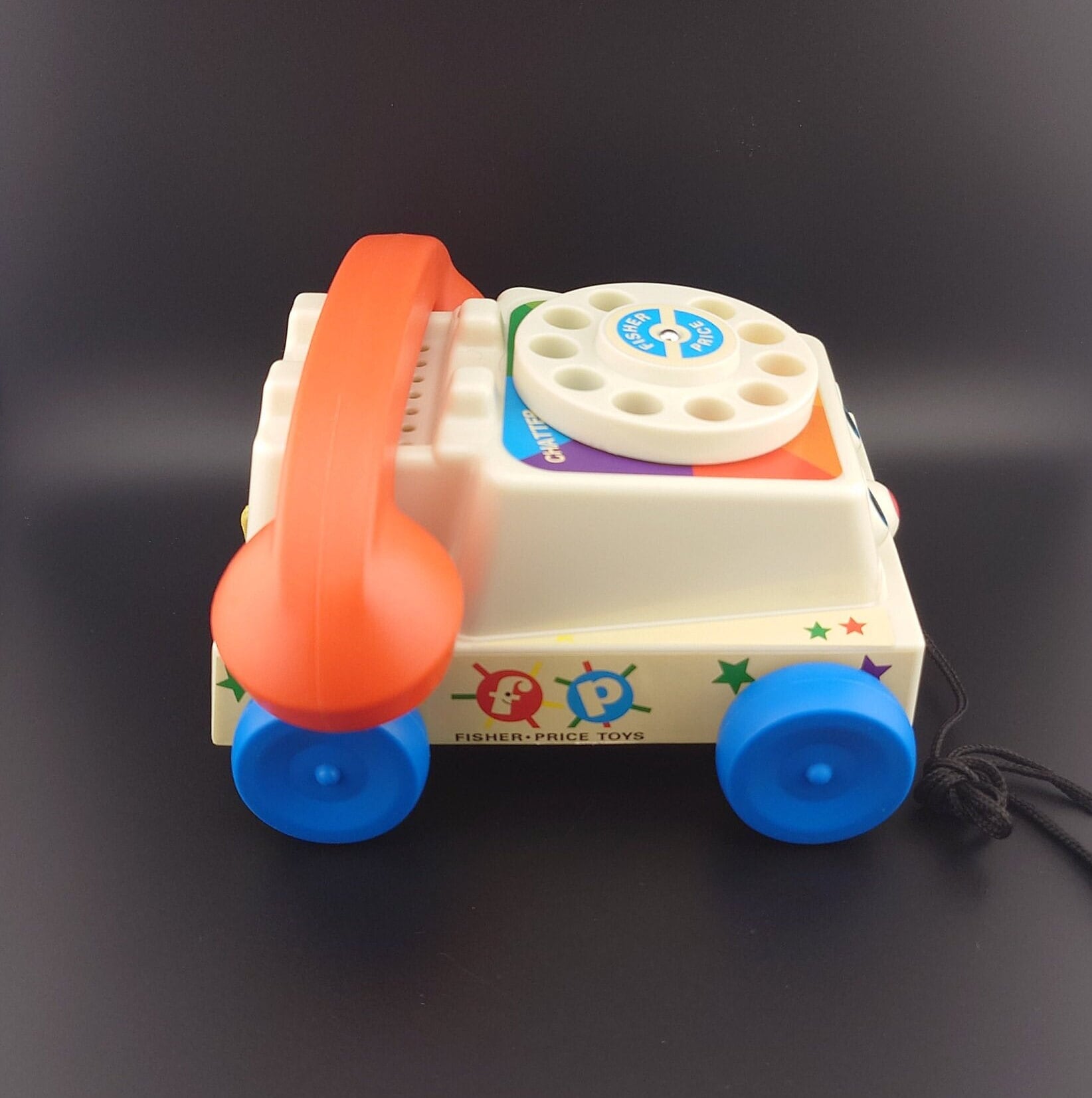 ディズニー　ピクサー　トイストーリー　チャッターフォン フィッシャープライス チャッターフォン 木製 1961 & 2000