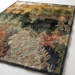 May include: A rectangular area rug featuring a multi-coloured damask pattern in shades of dark green, gold, rust, and cream. The surface has a textured, velvet-like appearance with the text NEELANSH CREATIONS repeated across the design.