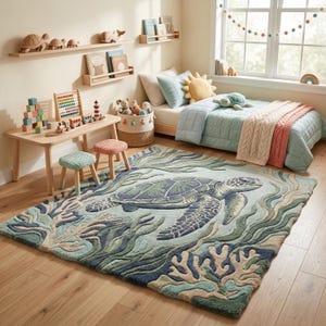 May include: A rectangular area rug featuring a large sea turtle design in shades of blue, green, and beige. The rug has a textured appearance, with the turtle in the center surrounded by coral and seaweed. The rug is placed in a child's bedroom.