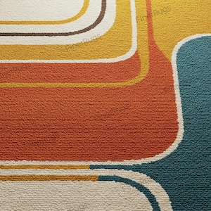 May include: A close-up of a retro-style rug with a textured surface. The rug features a pattern of curved lines and shapes in shades of orange, yellow, brown, teal, and white. The design evokes a vintage aesthetic.