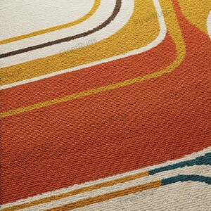 May include: Close-up of a retro-style rug with a textured surface. The rug features a pattern of curved lines in shades of orange, yellow, brown, teal, and cream. The rug's design evokes a vintage aesthetic.