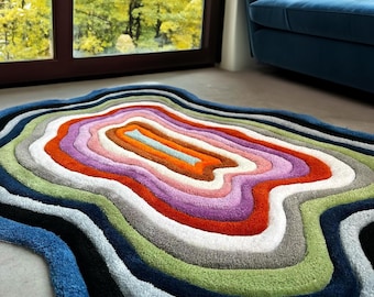 ブルーオレンジの不規則なハンドタフテッドアメーバシェイプのモダンな