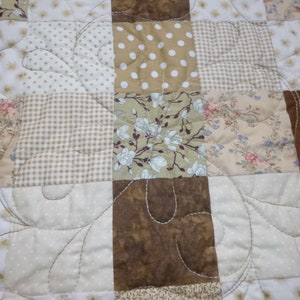Cream and gold hearts quilt