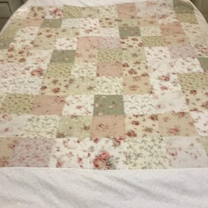 Vintage pink and green floral quilt