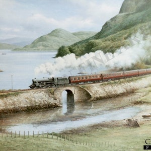 May include: A red train with a black steam engine travels over a stone bridge across a body of water. The train is surrounded by green hills and trees. The water is calm and reflects the sky and clouds.
