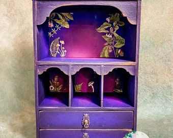 SOLD Apothecary cabinet wall mounted display shelf and drawers in purple & pink